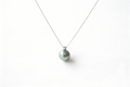 Diana-style Tahitian pearl pendant with 18K white gold chain.